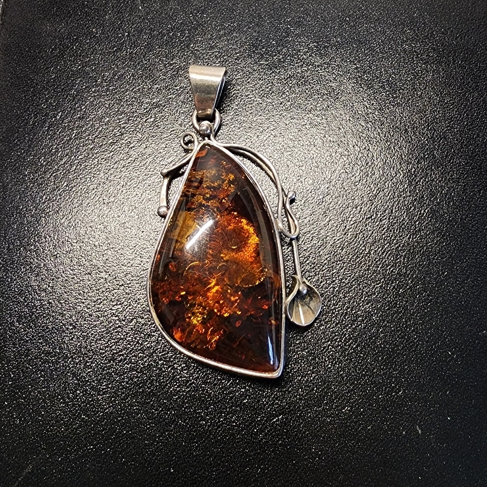 Elegant Amber Pendant with Silver Accents - Picture 3 of 5